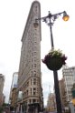 The flatiron building was completed way back in 1902. The architect was a famous Chicagoan, Daniel Burnham.
