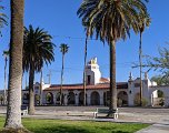 The Spanish colonial town square features a repurposed rail depot.