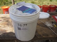 Our resupply bucket, mailed from Saint Paul, was awaiting us. Construction buckets are popular for food caches to combat hungry mice in the storage hut.